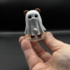 spooky-ghost-main Ghost bear figurine held in hand