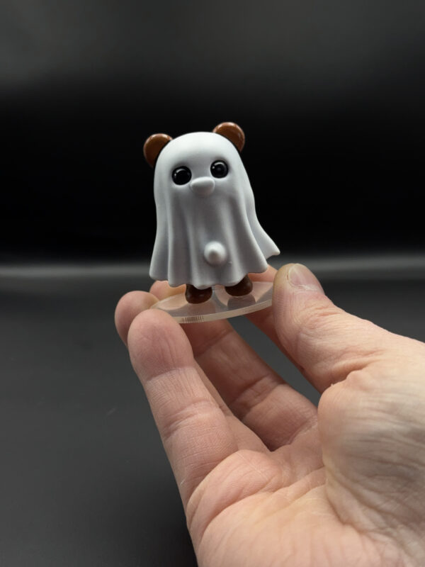 spooky-ghost-main Ghost bear figurine held in hand
